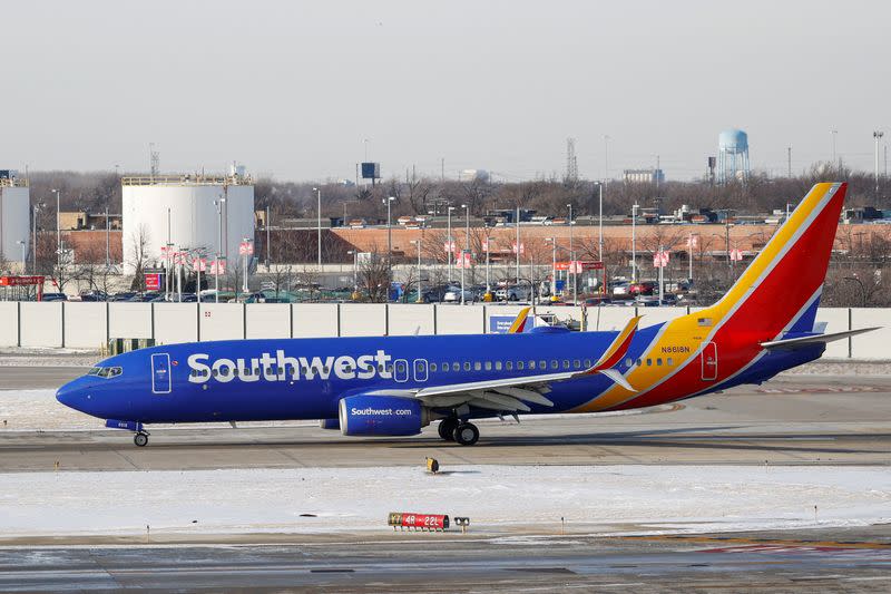 FILE PHOTO: Travelers deal with weather cancellations at Chicago Midway International Airport