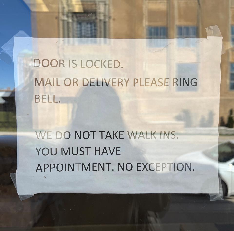 After sending vacate notices to tenants of 2435 West Wisconsin Avenue, Becovic locked its office door and began requiring appointments.