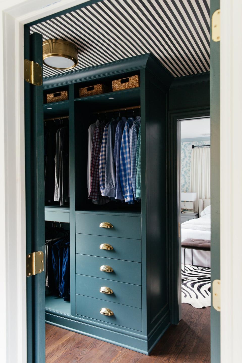 A blue walk-in closet