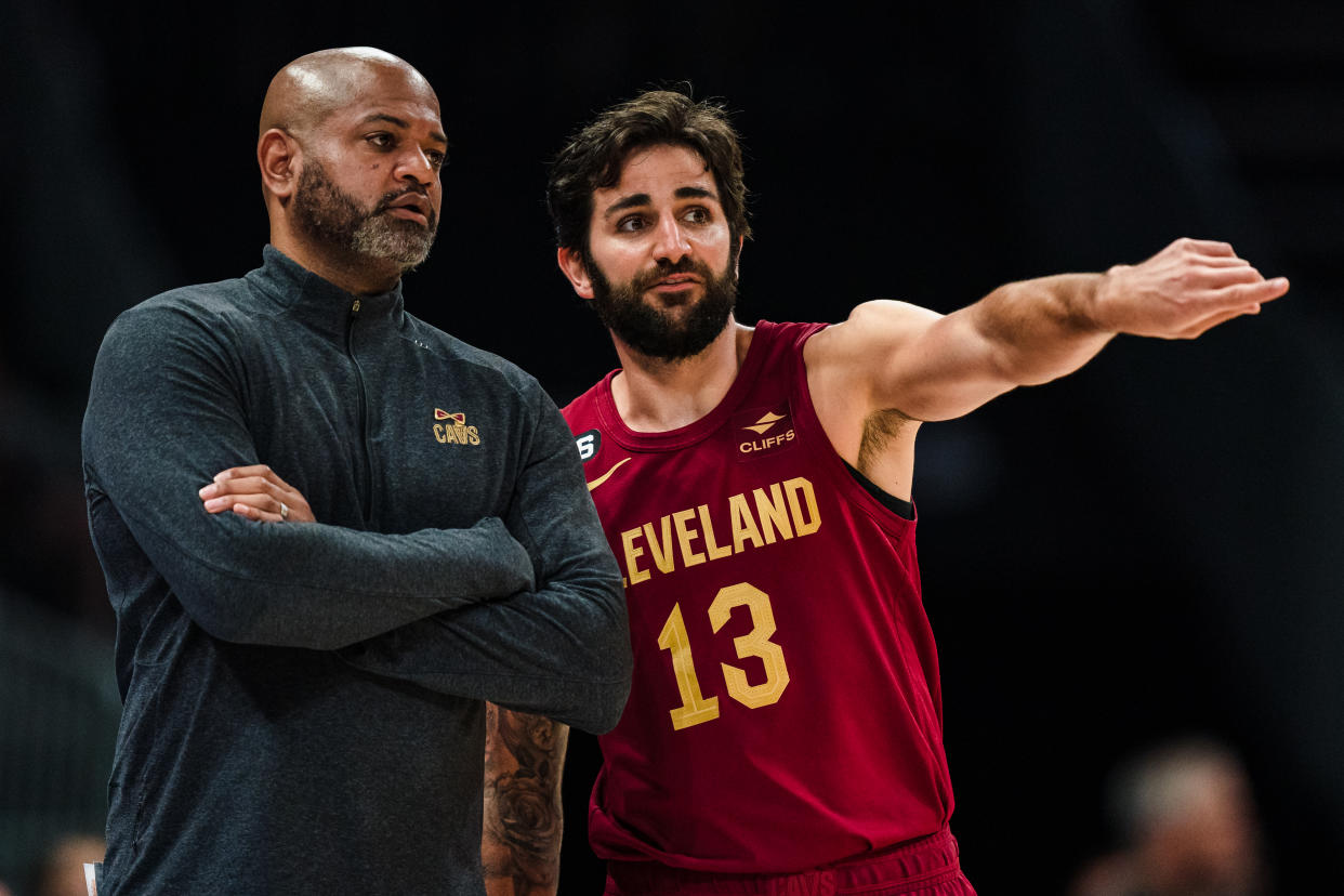 CHARLOTTE, NORTH CAROLINA - MARCH 12: Head coach J.B. Bickerstaff of the Cleveland Cavaliers talks with Ricky Rubio #13 during their game against the Charlotte Hornets at Spectrum Center on March 12, 2023 in Charlotte, North Carolina. NOTE TO USER: User expressly acknowledges and agrees that, by downloading and or using this photograph, User is consenting to the terms and conditions of the Getty Images License Agreement. (Photo by Jacob Kupferman/Getty Images)