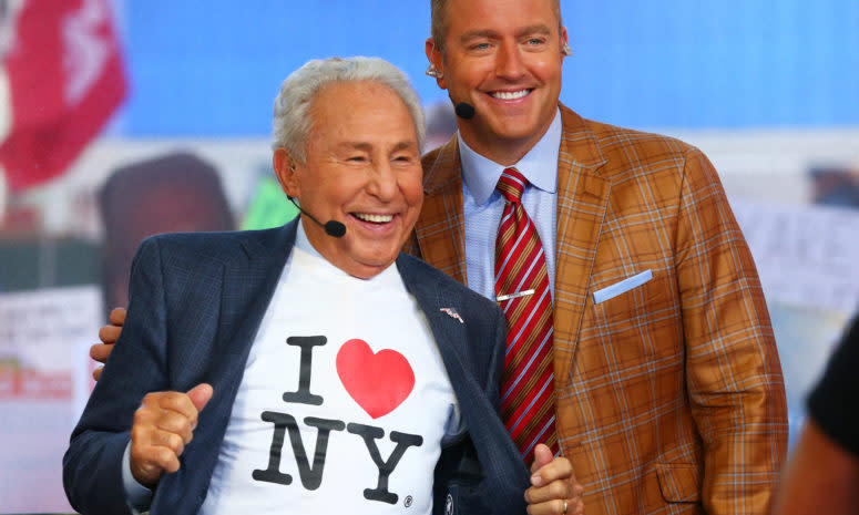 Lee Corso wearing an I Love New York T-Shirt while posing for a photo with Kirk Herbstreit.