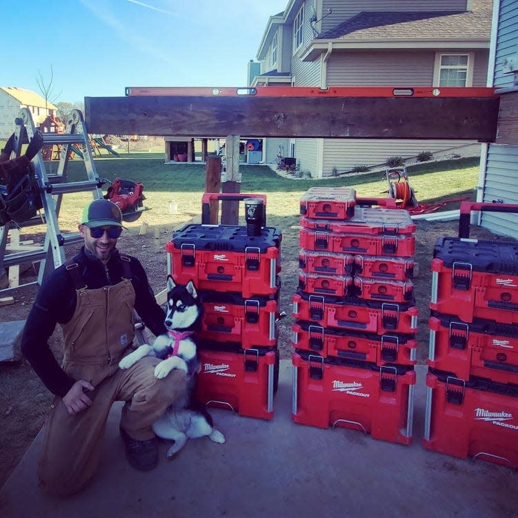 Brock Held and his dog, Athena, offered to donate the labor and the supplies to build a wheelchair ramp for anyone who was injured at the Waukesha Christmas Parade on Sunday.