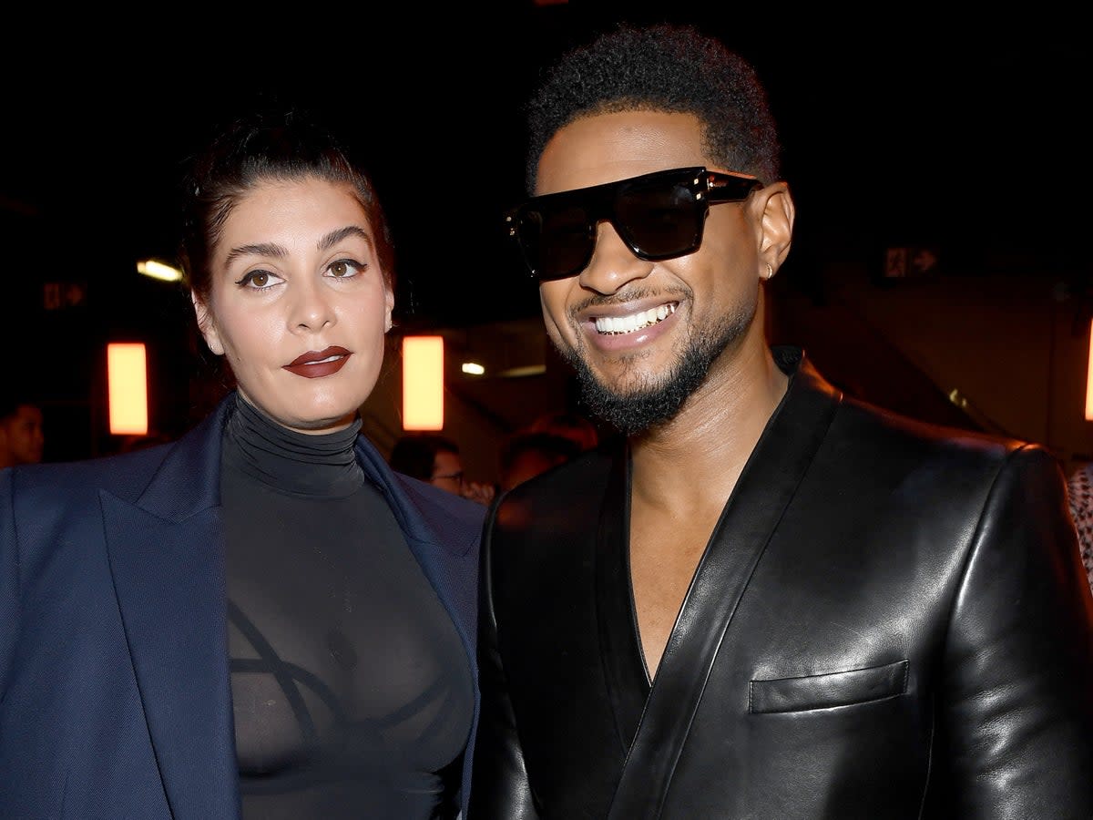 Usher with Jenn Goicoechea (Getty Images)