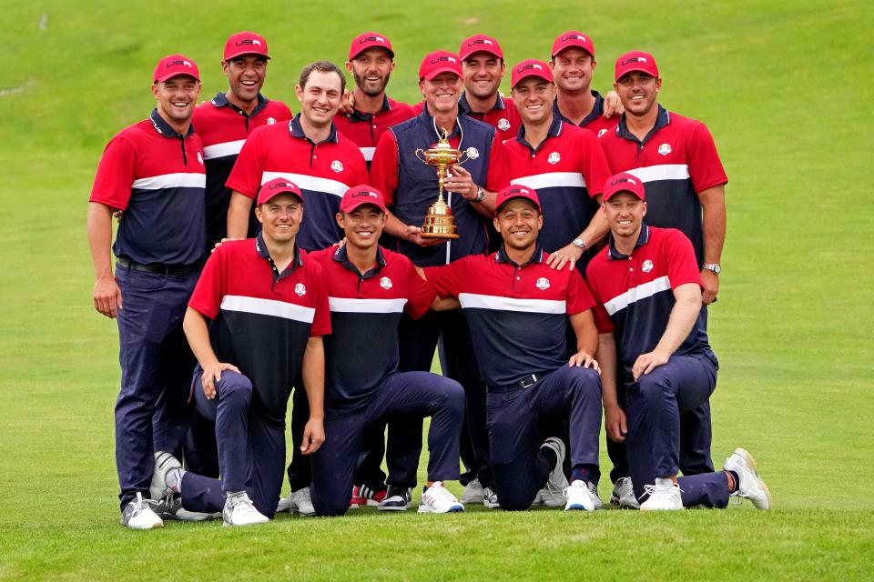 The U.S. team poses with the Ryder Cup after beating Europe at the 43rd Ryder Cup golf competition in 2021 at Whistling Straits in Wisconsin.