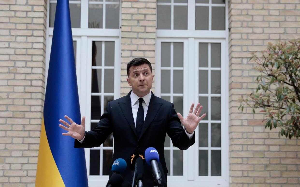 Zelenskiy gave a press conference at the Ukrainian embassy in Paris before his meeting with Macron and Merkel - AP