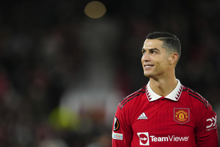 FILE - Manchester United's Cristiano Ronaldo smiles before the start of the Europa League group E soccer match between Manchester United and Sheriff at Old Trafford in Manchester, England, Thursday Oct. 27, 2022. Saudi Arabian soccer club Al Nassr on Friday, Dec. 30, 2022, announced the signing of Ronaldo, ending speculation about the five-time Ballon d'Or winner's future. (AP Photo/Jon Super, File)