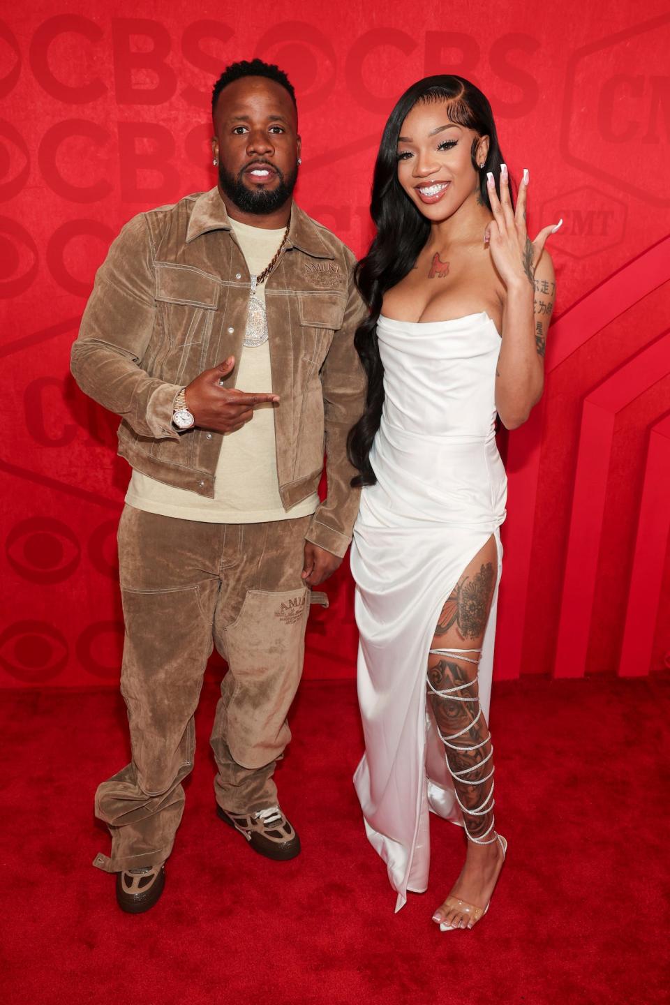 Yo Gotti and GloRilla attend the 2024 CMT Music Awards.