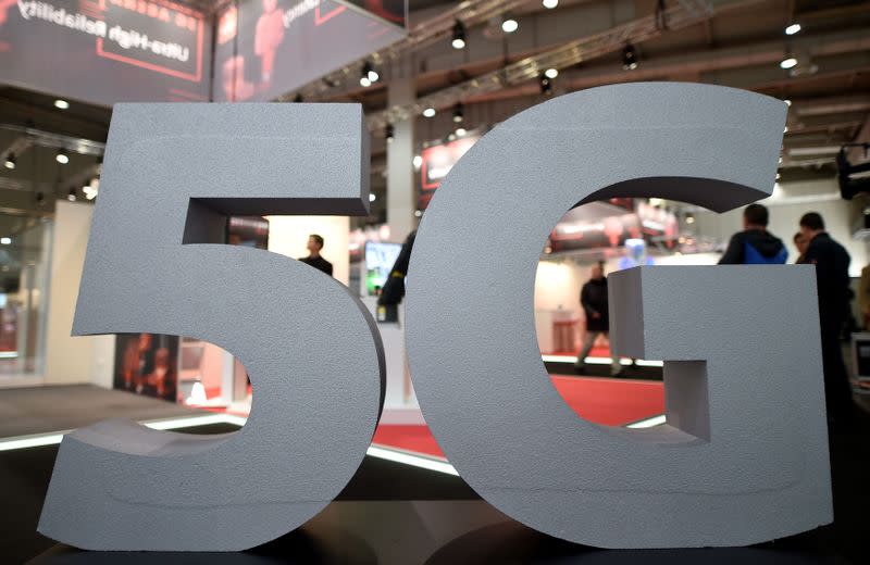 FILE PHOTO: A logo of the upcoming mobile standard 5G is pictured at the Hanover trade fair, in Hanover