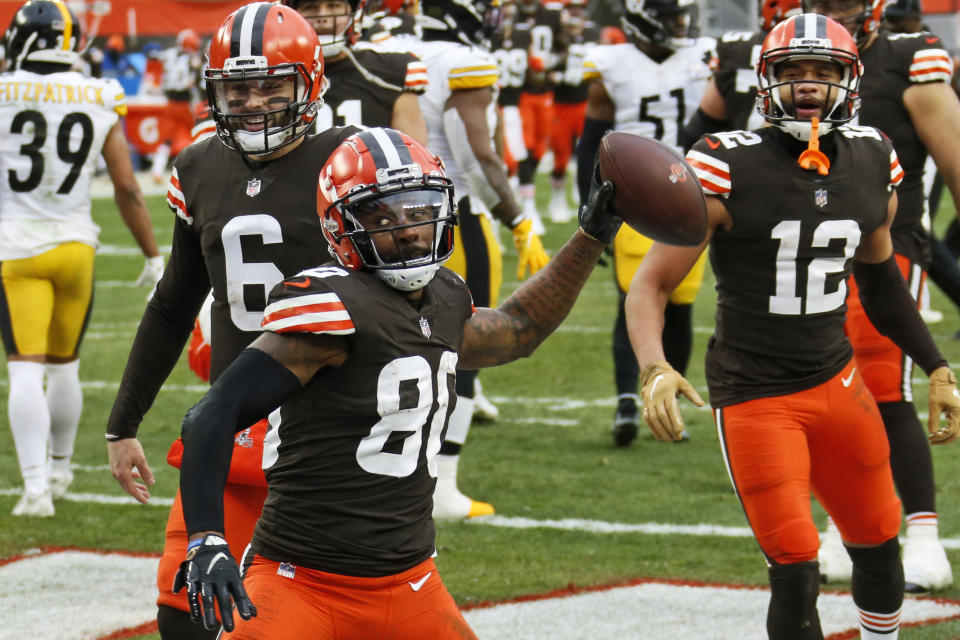 Cleveland Browns wide receiver Jarvis Landry (80) celebrates after scoring a 3-yard touchdown during the second half of an NFL football game against the Pittsburgh Steelers, Sunday, Jan. 3, 2021, in Cleveland. (AP Photo/Ron Schwane)