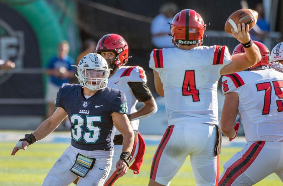 West Florida's Will Breland goes after North Grenville quarter back Dylan Ramirez as they take on North Greenville at Pen Air Field at the University of West Florida Saturday,, October 1, 2022.