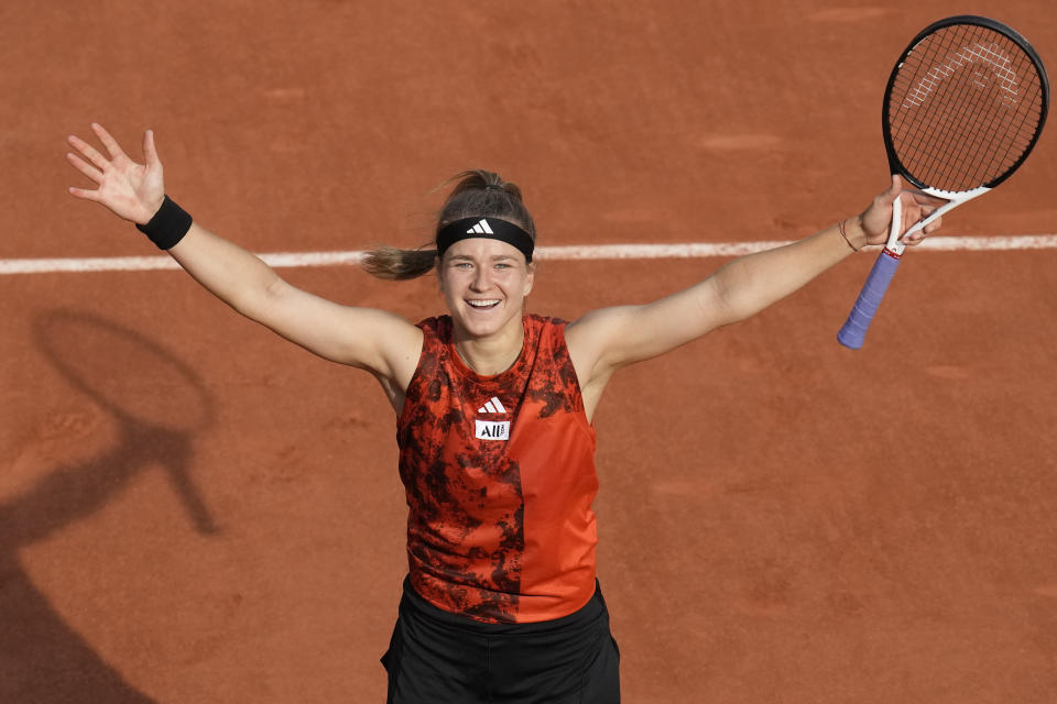 Karolina Muchova of the Czech Republic celebrates winning her semifinal match of the French Open tennis tournament against Aryna Sabalenka of Belarus in three sets, 7-6 (7-5), 6-7 (5-7), 7-5, at the Roland Garros stadium in Paris, Thursday, June 8, 2023. (AP Photo/Christophe Ena)