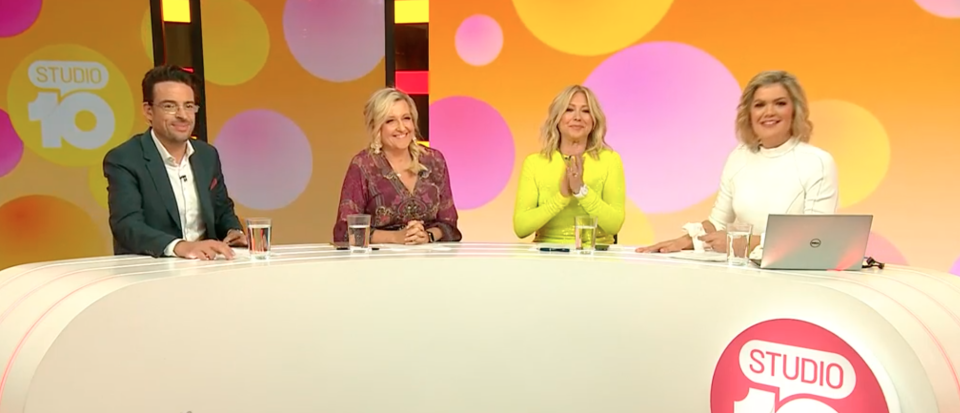 Studio 10 hosts sit at the panel desk