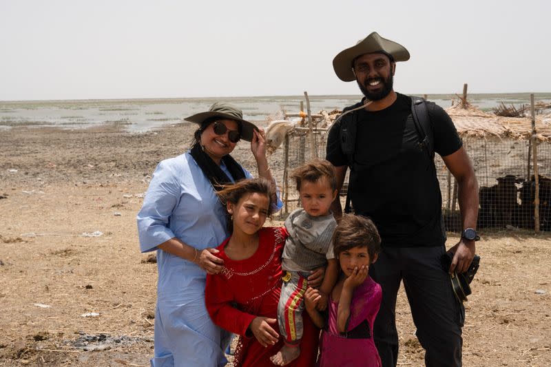 Lorin and Galton Lenie, French tourists of Sri Lankan descent, during a tour the marshes, in Nassiriya