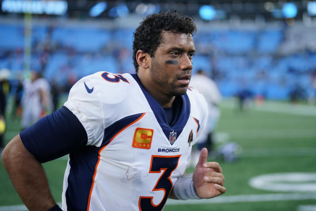 Denver Broncos quarterback Russell Wilson warms up before an NFL football  game against the Carolina Panthers on Sunday, Nov. 27, 2022, in Charlotte,  N.C. (AP Photo/Rusty Jones Stock Photo - Alamy