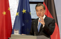 China's Foreign Minister Wang Yi addresses the media during a joint press conference with German Foreign Minister Heiko Maas as part of a meeting in Berlin, Germany, Tuesday, Sept. 1, 2020. (AP Photo/Michael Sohn, pool)
