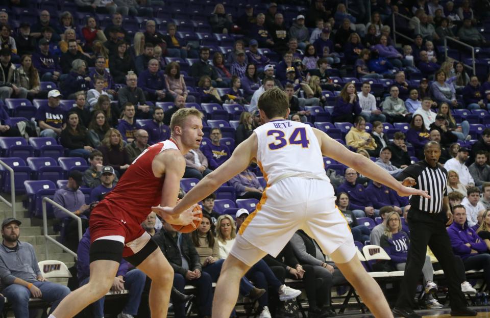 Rienk Mast (left) matches up against James Betz and had 15 points over the final 16 minutes to lead Bradley to a 77-69 win over Northern Iowa in a Missouri Valley Conference game at McLeod Center in Cedar Falls, Iowa on Saturday, Feb. 4, 2023.