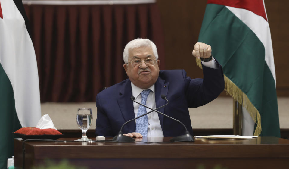 Palestinian President Mahmoud Abbas heads a leadership meeting at his headquarters, in the West Bank city of Ramallah, Tuesday, May 19, 2020. (Alaa Badarneh/Pool Photo via AP)