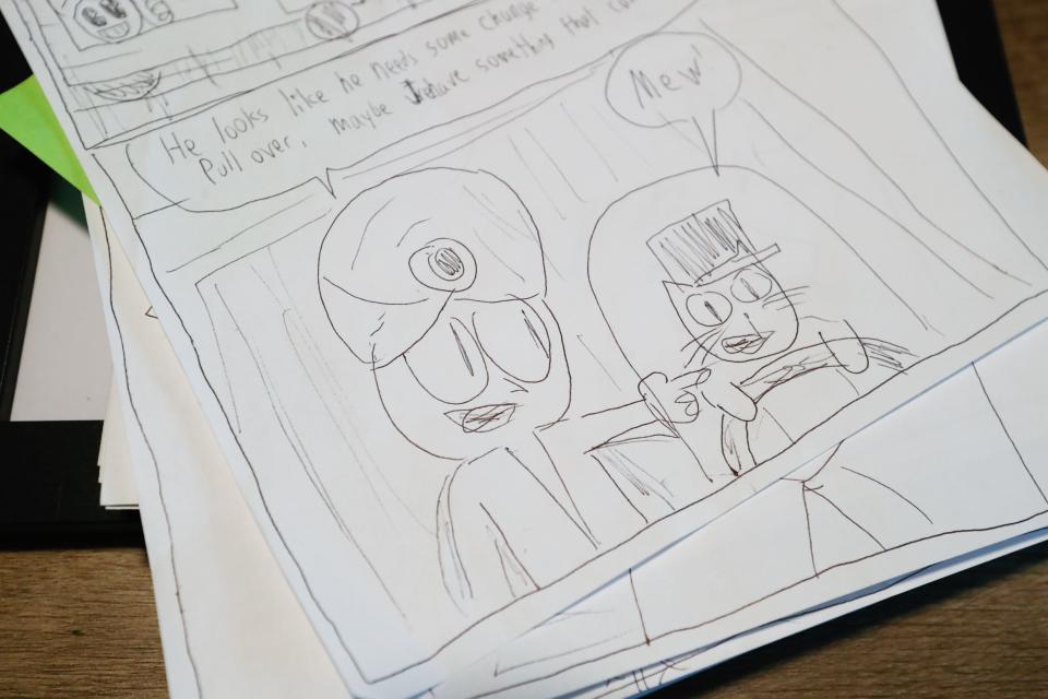 Comic pages written by Hamilton Southeastern student Jason Funk, who has autism, and later illustrated by fellow comic book artist Yuri Duncan on Thursday, May 5, 2022, at Funk's home in Indiana.