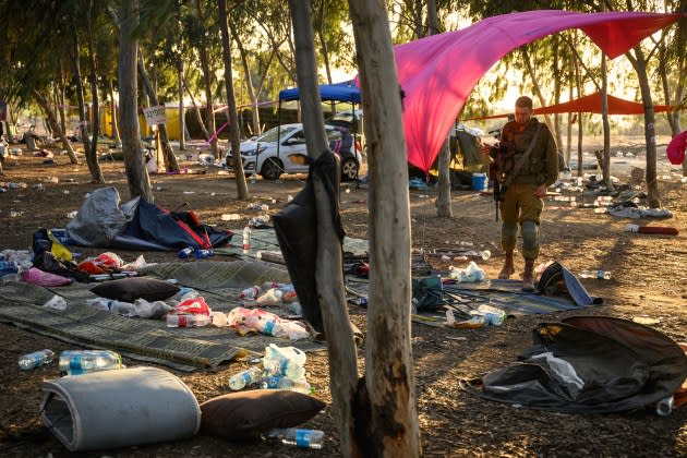 Israeli security forces search the grounds of the Supernova Music Festival, where Hamas fighters  killed hundreds and abducted dozens more.