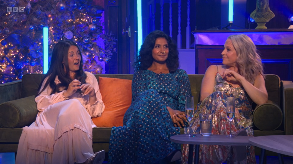 eastenders the six on bbc three, lacey turner, balvinder sopal and kellie bright sit on a sofa in front of a christmas tree