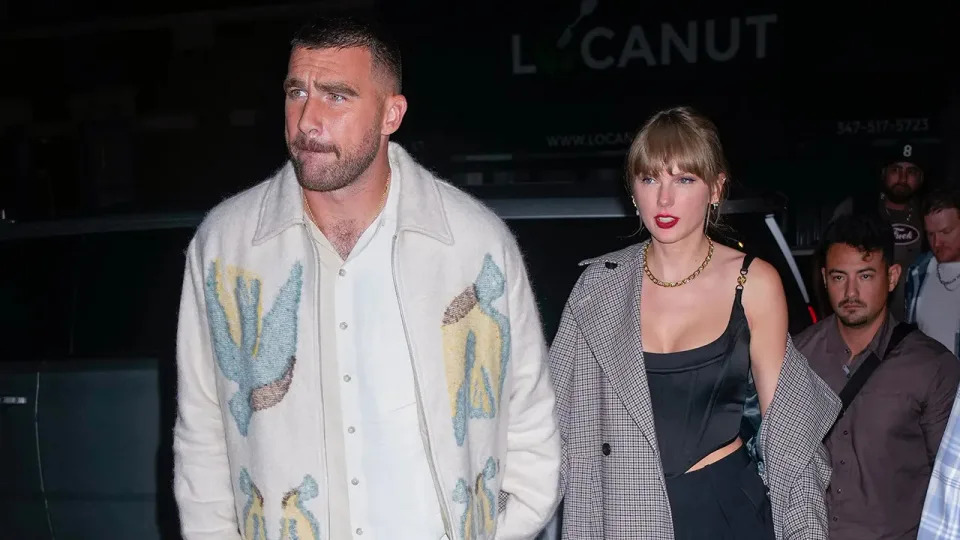 Travis Kelce wears bird jacket with Taylor swift in all black on date night