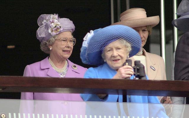 Queen Elizabeth II and her mother Queen Elizabeth The Queen Mother watches the finish of the Derby from the Royal Box at Epsom Downs in Surrey 2001