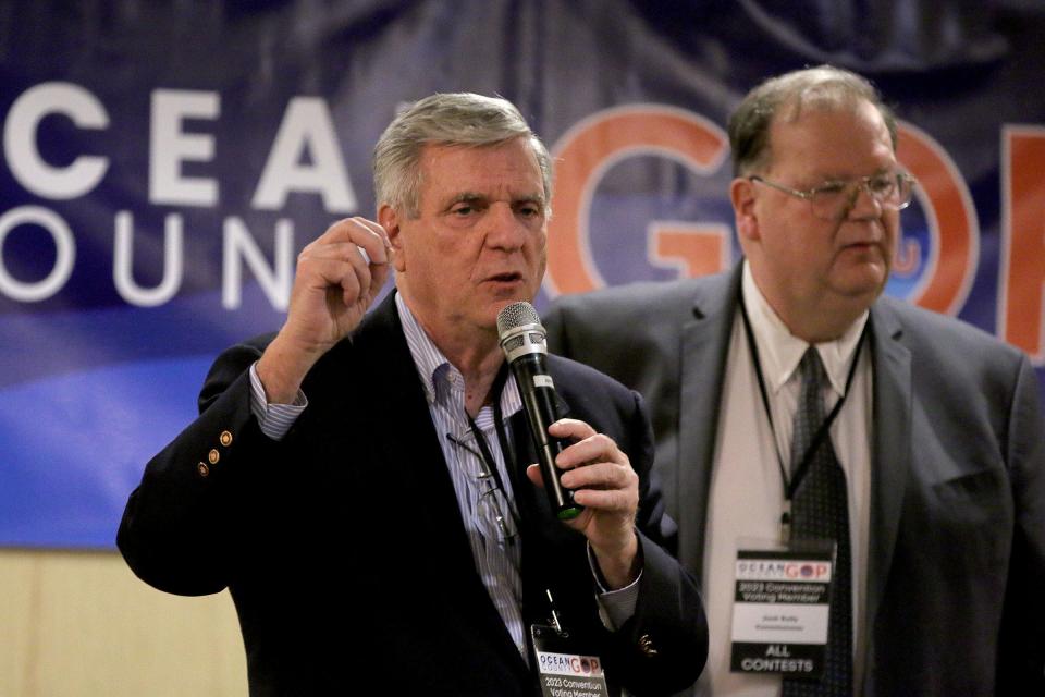 Ocean County Republican Chairman George Gilmore speaks during the nominating convention Wednesday evening, March 8, 2023, in Toms River.  Behind him is County Commissioner Jack Kelly.