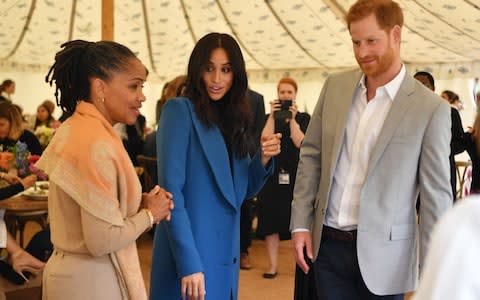 The Duke and Duchess of Cambridge are accompanied by Doria Ragland in a tent at Kensington Palace - Credit: BEN STANSALL /AFP