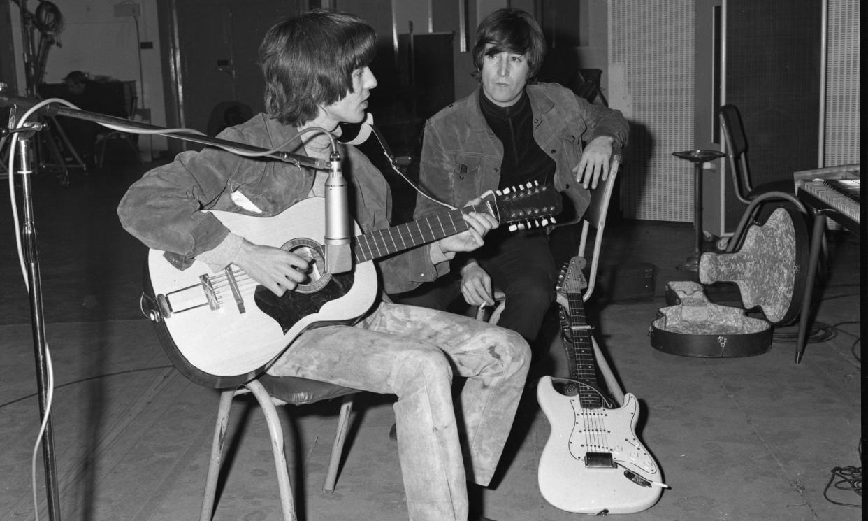 <span>George Harrison plays John Lennon’s Framus 12-string Hootenanny acoustic guitar.</span><span>Photograph: Julien's Auctions/ Beatles Photo Library</span>