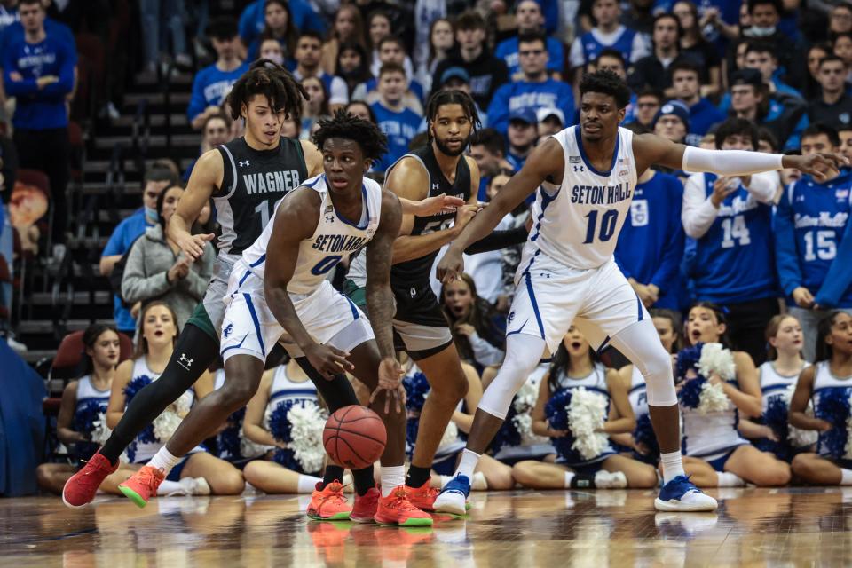 Seton Hall Pirates guard Kadary Richmond (0) dribbles as Wagner Seahawks guard Zaire Williams (12) defends during the first half at Prudential Center.