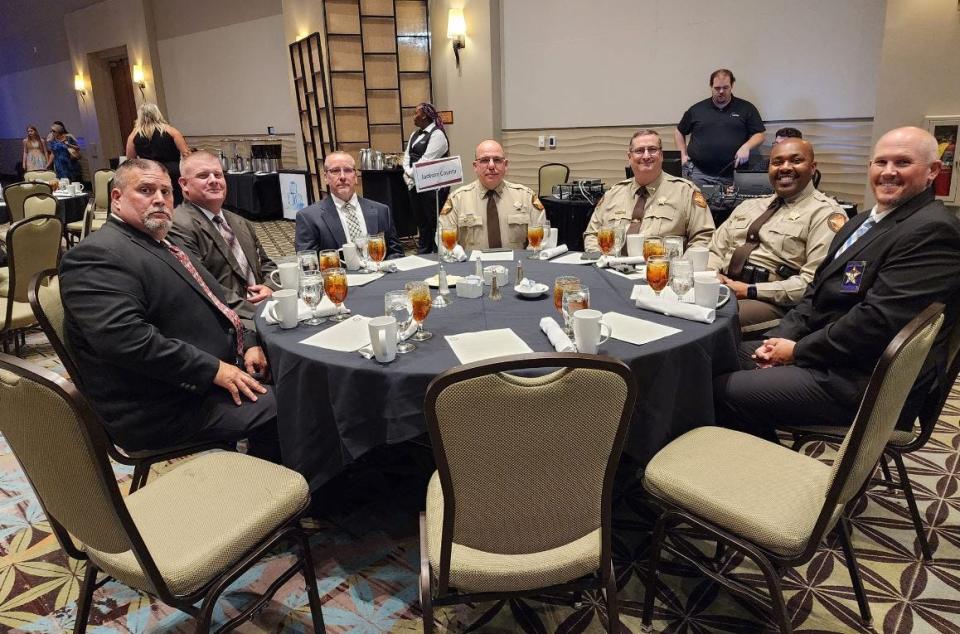 Jackson County officials and command staff deputies with the sheriff's office attended the banquet where Janis Mangum was honored by her peers as the 2023 Sheriff of the Year.