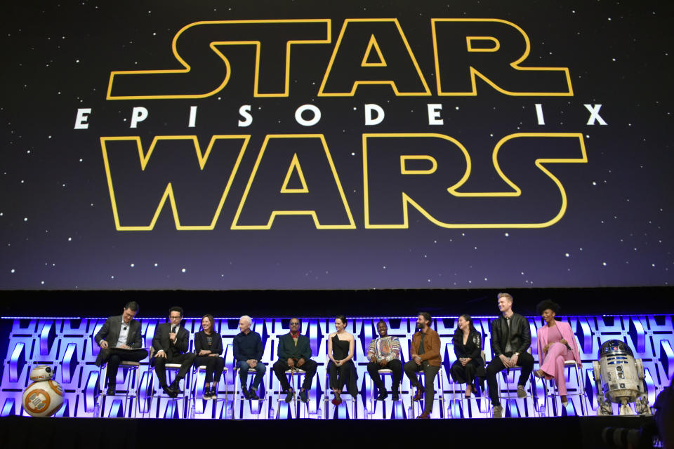 Stephen Colbert, from left, J.J. Abrams, Kathleen Kennedy, Anthony Daniels, Billy Dee Williams, Daisy Ridley, John Boyega, Oscar Isaac, Kelly Marie Tran, Joonas Suotamo and Naomi Ackie participate in the "Star Wars: The Rise of Skywalker" panel on day 1 of the Star Wars Celebration at Wintrust Arena on Friday, April 12, 2019, in Chicago. (Photo by Rob Grabowski/Invision/AP)