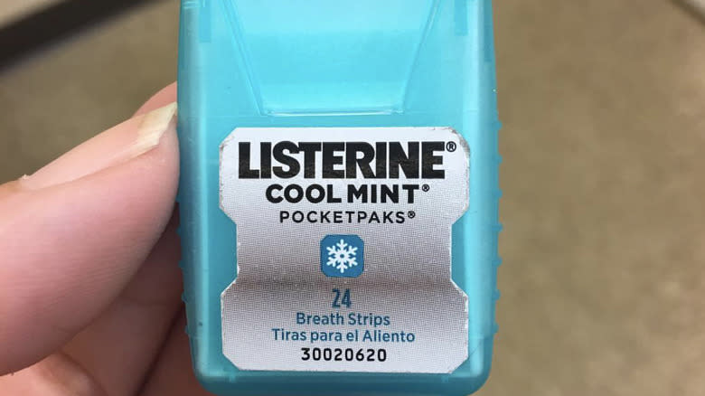 listerine pocketpaks in hand