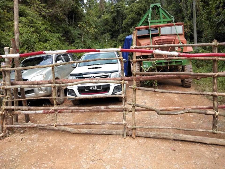 In the last couple of years, Orang Asli communities in Perak, Pahang and Kelantan have been forced to erect blockades against loggers who have encroached on their ancestral lands. — Picture courtesy of Facebook/Siti Kasim