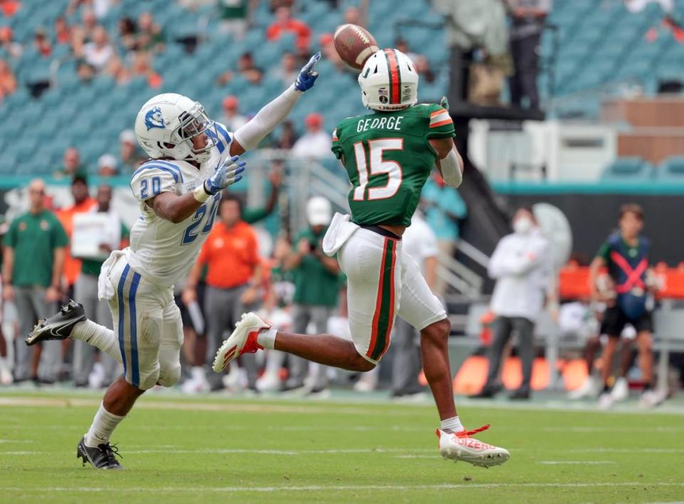 Miami Hurricanes wide receiver Jacolby George (15) runs 44 yards to score on a pass reception in the third as Central Connecticut State Blue Devils defensive back Justice Calloway (20) fails to defend at Hard Rock Stadium in Miami Gardens on Saturday, September 25, 2021.