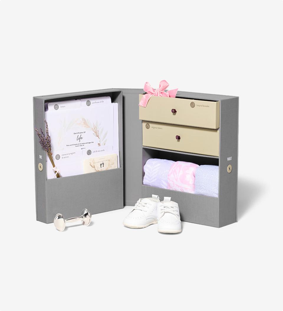 <p><a href="https://savor.us/products/the-vault-baby-remembrance-box?currency=USD&gad_source=1&gclid=CjwKCAjw8diwBhAbEiwA7i_sJQzXw8ivnbZsESVt28GvJpxpJv_2jMBQ5GLCC5lVfu6Uttor_pXAFhoCsTsQAvD_BwE&variant=37947939160248" rel="nofollow noopener" target="_blank" data-ylk="slk:Shop Now;elm:context_link;itc:0;sec:content-canvas" class="link ">Shop Now</a></p><p>Baby Loss and Remembrance Vault Keepsake Box</p><p>savor.us</p><p>$100.00</p><span class="copyright">Savor</span>