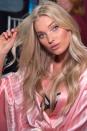 <p>Angel Elsa Hosk showing off the creamy pink lipstick and pop of highlighter backstage. </p>