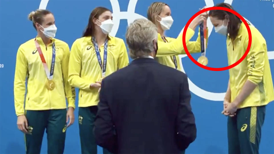 Members of Australia's winning 4x200m freestyle relay team presented one another with their gold medals at the Tokyo Olympics podium on Sunday. Picture: Channel 7