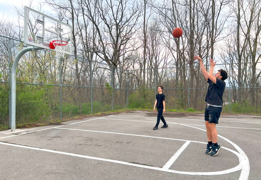 Milan Hall (shooting the ball) and Couper Mann – Photo Courtesy: Chris Mabe