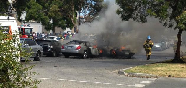 Four cars go up in flames outside IGA supermarket in Bentleigh. Photo: Twitter @DrSallyCockburn