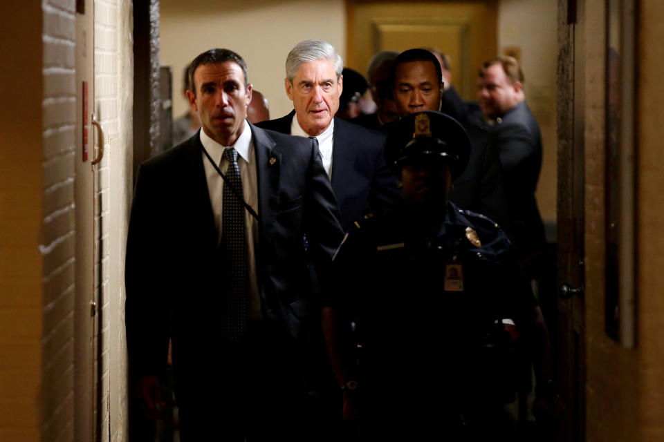 Special counsel Robert Mueller&nbsp;is surrounded by police and security after briefing members of the Senate on his Russia investigation last year. (Photo: Joshua Roberts / Reuters)