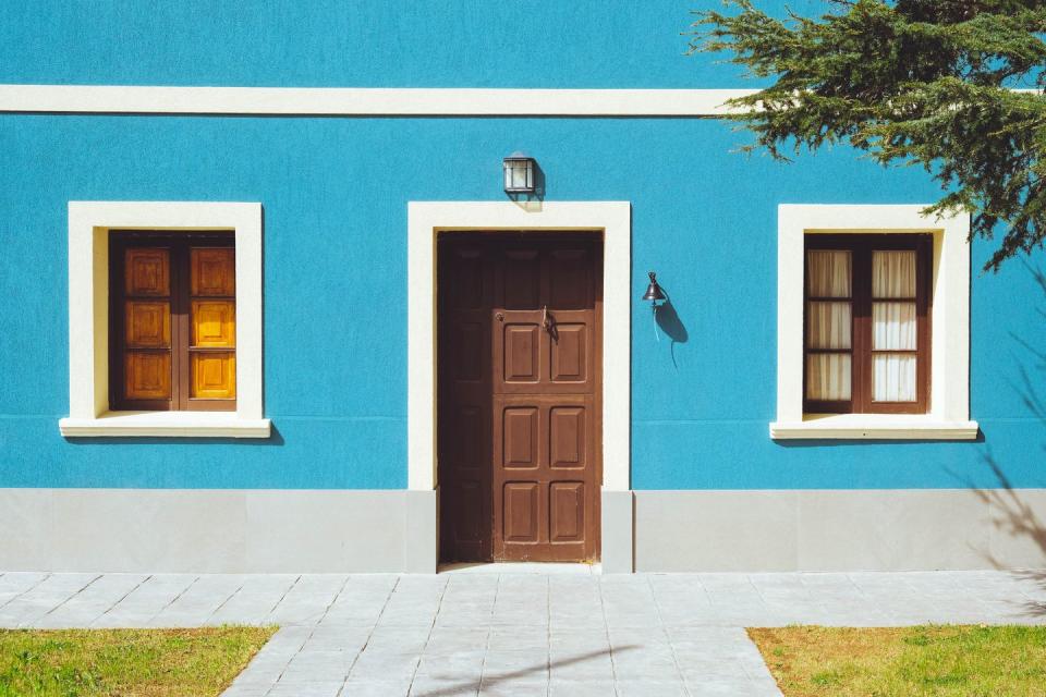 frontal view of a blue house