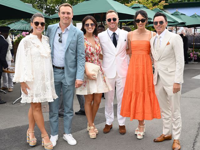 <p>Karwai Tang/WireImage</p> Annie Verret, Jordan Spieth, Jillian Wisniewski, Justin Thomas, Allison Stokke and Rickie Fowler attend day seven of the 2023 Wimbledon Tennis Championships