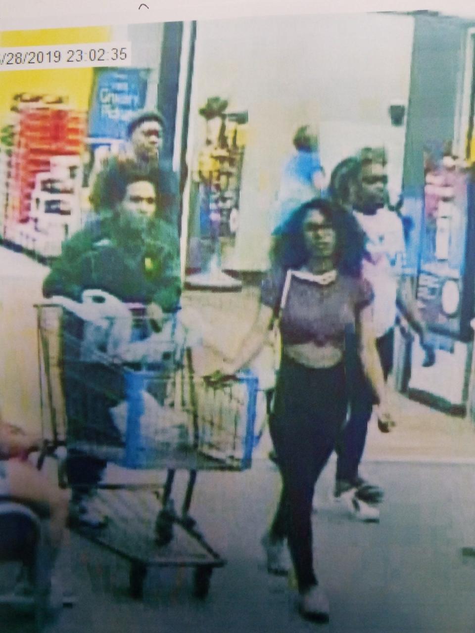 Police believe this woman is responsible for licking a half-gallon tub of Blue Bell ice cream and then putting it back on store shelves.