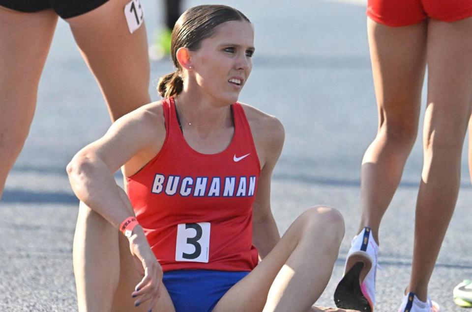 Buchanan’s Grace Hutchison looks to the scoreboard after the Girls 1600 M Run at the 2023 CIF California Track & Field State Championship qualifiers Friday, May 26, 2023 in Clovis.