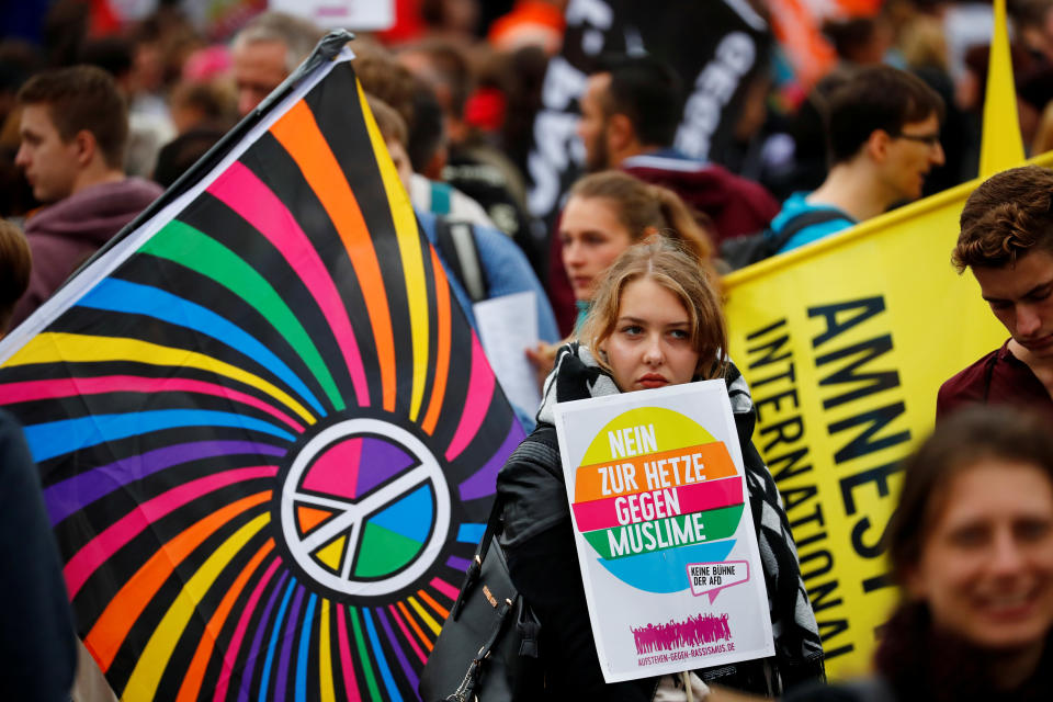 <p>People protest against a demonstration of Anti-immigration party Alternative for Germany (AfD) in Chemnitz, Germany, Sept. 1, 2018. The banner reads “No muslim baiting”. (Photo: Hannibal Hanschke/Reuters) </p>