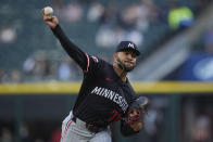 Minnesota Twins starting pitcher Simeon Woods Richardson throws against the Chicago White Sox during the first inning of a baseball game Tuesday, April 30, 2024, in Chicago. (AP Photo/Erin Hooley)