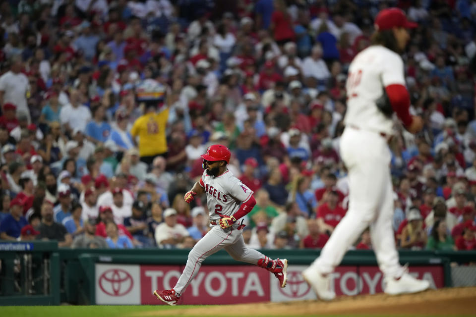 Los Angeles Angels' Luis Rengifo, left, rounds the bases after hitting a home run against Philadelphia Phillies pitcher Michael Lorenzen during the fourth inning of a baseball game, Tuesday, Aug. 29, 2023, in Philadelphia. (AP Photo/Matt Slocum)