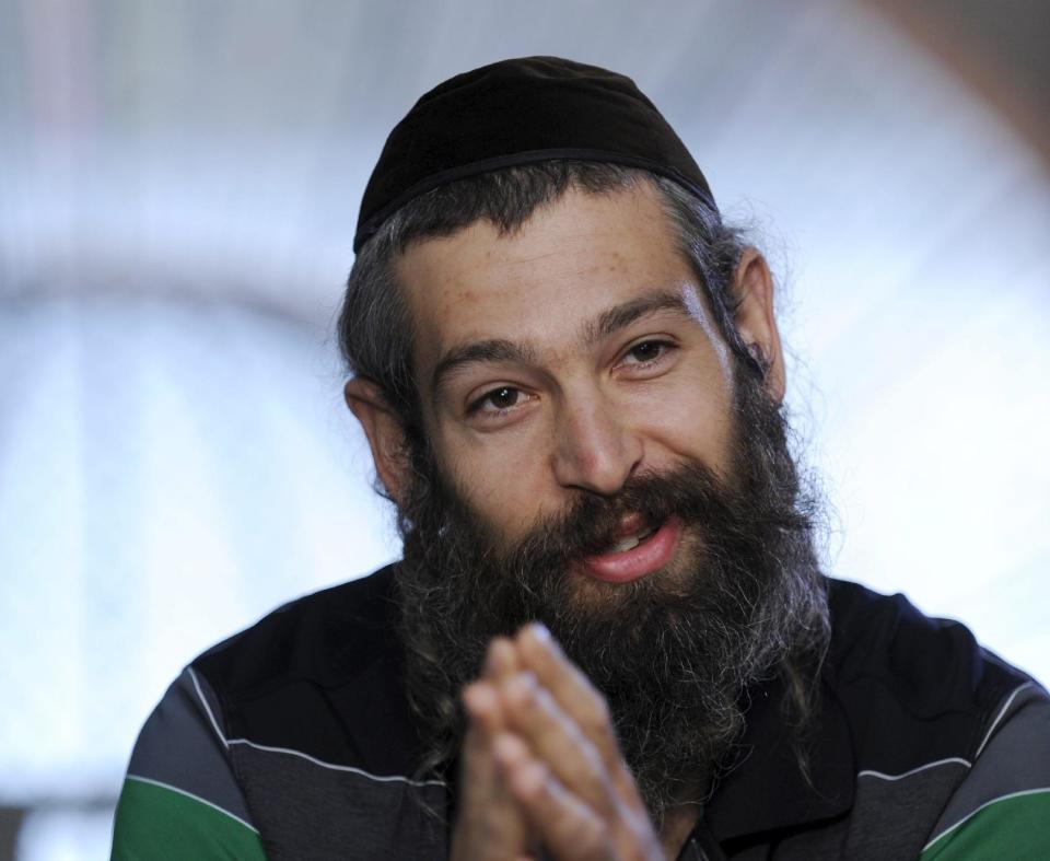 FILE - This Sept. 3, 2010 file photo shows Hassidic raggae musician Matthew Paul Miller, aka Matisyahu, during an interview in Budapest, Hungary. The 33-year-old Matisyahu is far from the one who lived for years in a modest apartment in Crown Heights, the Orthodox Jewish neighborhood in Brooklyn. He's moved his wife and three sons to Los Angeles, favors pastels over dark suits, ditched the yarmulke, changed his management team, and is self-releasing his music. This month, he releases his fourth studio CD, "Spark Seeker," a fresh sound produced by Kool Kojak with reggae, hip-hop and electronica layered over Middle Eastern instruments and rhythms. (AP Photo/MTI, Zsolt Demecs, file)