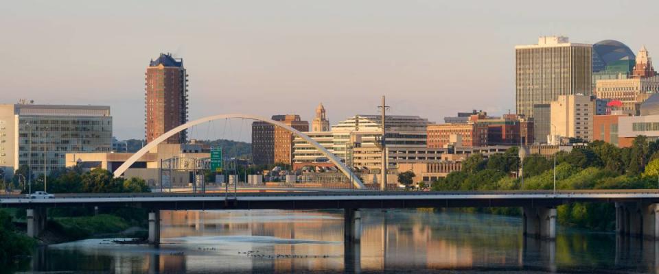 Des Moines, Iowa - JULY 16: Downtown Des Moines at dawn from the University Avenue bridge on July 16, 2016 in Des Moines, Iowa